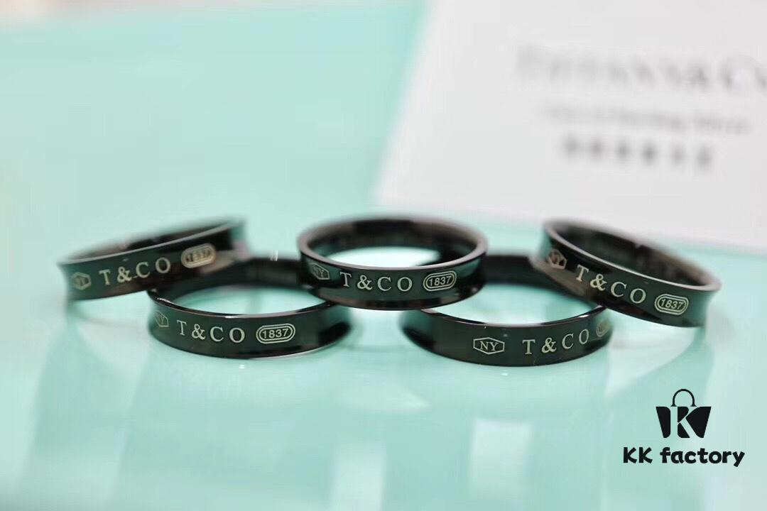 692fd64199f2d84055c8a8a1 Tiffany & Co. 1037 Titanium Ring 🌷🌷 The Tiffany 1837™ Collection, engraved with the founding year of Tiffany, is perfectly interpreted through smooth curves and elegant contours. This sophisticated ring is a timeless classic. An ideal choice for couples 👫, best friends, or as a single band 💒. Made of titanium, hypoallergenic.