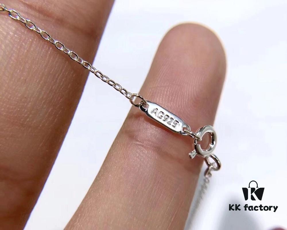 692fd64f99f2d84055c8a8c6 Tiffany Double Ring Necklace with Dual Hoop Pendant Featuring Engraved Founding Year