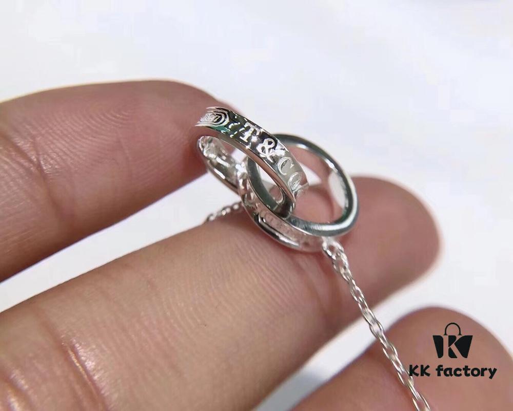 692fd65299f2d84055c8a8c8 Tiffany Double Ring Necklace with Dual Hoop Pendant Featuring Engraved Founding Year