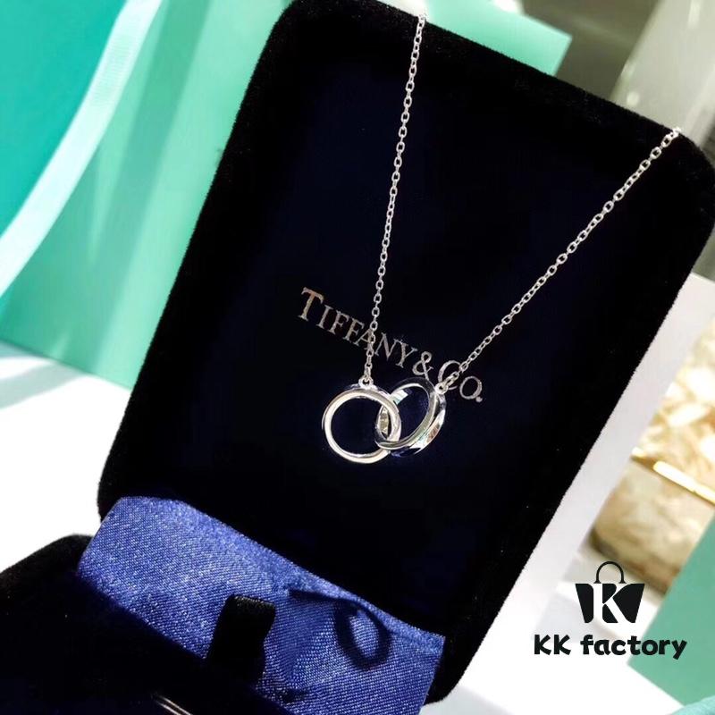 692fd65399f2d84055c8a8cd Tiffany Double Ring Necklace with Dual Hoop Pendant Featuring Engraved Founding Year