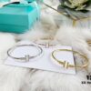 692fd68299f2d84055c8a93b Tiffany & Co. Classic T-Shape Diamond Double-T Bracelet