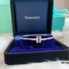 692fd68399f2d84055c8a93e Tiffany & Co. Classic T-Shape Diamond Double-T Bracelet