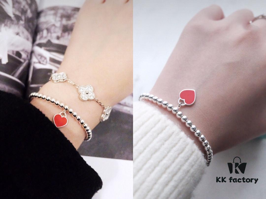 Woman Wearing Tiffany Heart Bracelet
