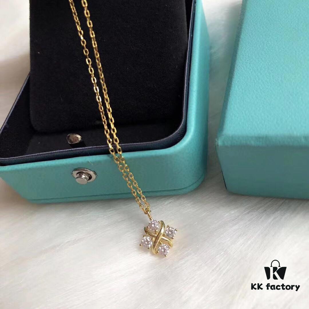 692fd6cd99f2d84055c8a9d1 Tiffany & Co. Schlumberger Series Cross Four-Diamond Necklace, Minimalist and Versatile