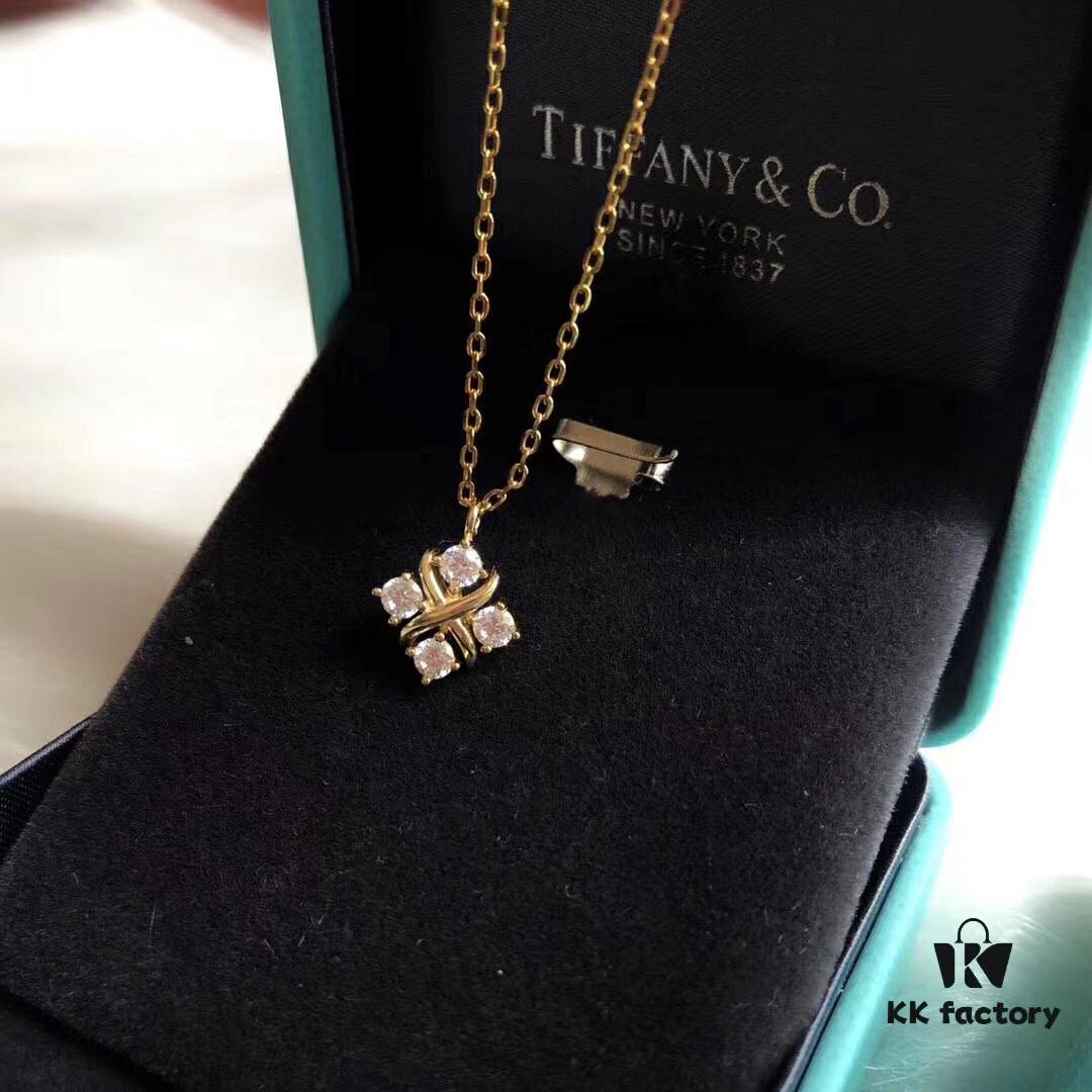 692fd6cd99f2d84055c8a9d2 Tiffany & Co. Schlumberger Series Cross Four-Diamond Necklace, Minimalist and Versatile