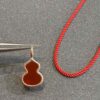692fd82f99f2d84055c8ac26 Exceptional! Mr. Bag × Q Limited Edition Collab Necklace with Pendant and Red String