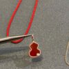 692fd83999f2d84055c8ac3b Exceptional! Mr. Bag × Q Limited Edition Collab Necklace with Pendant and Red String