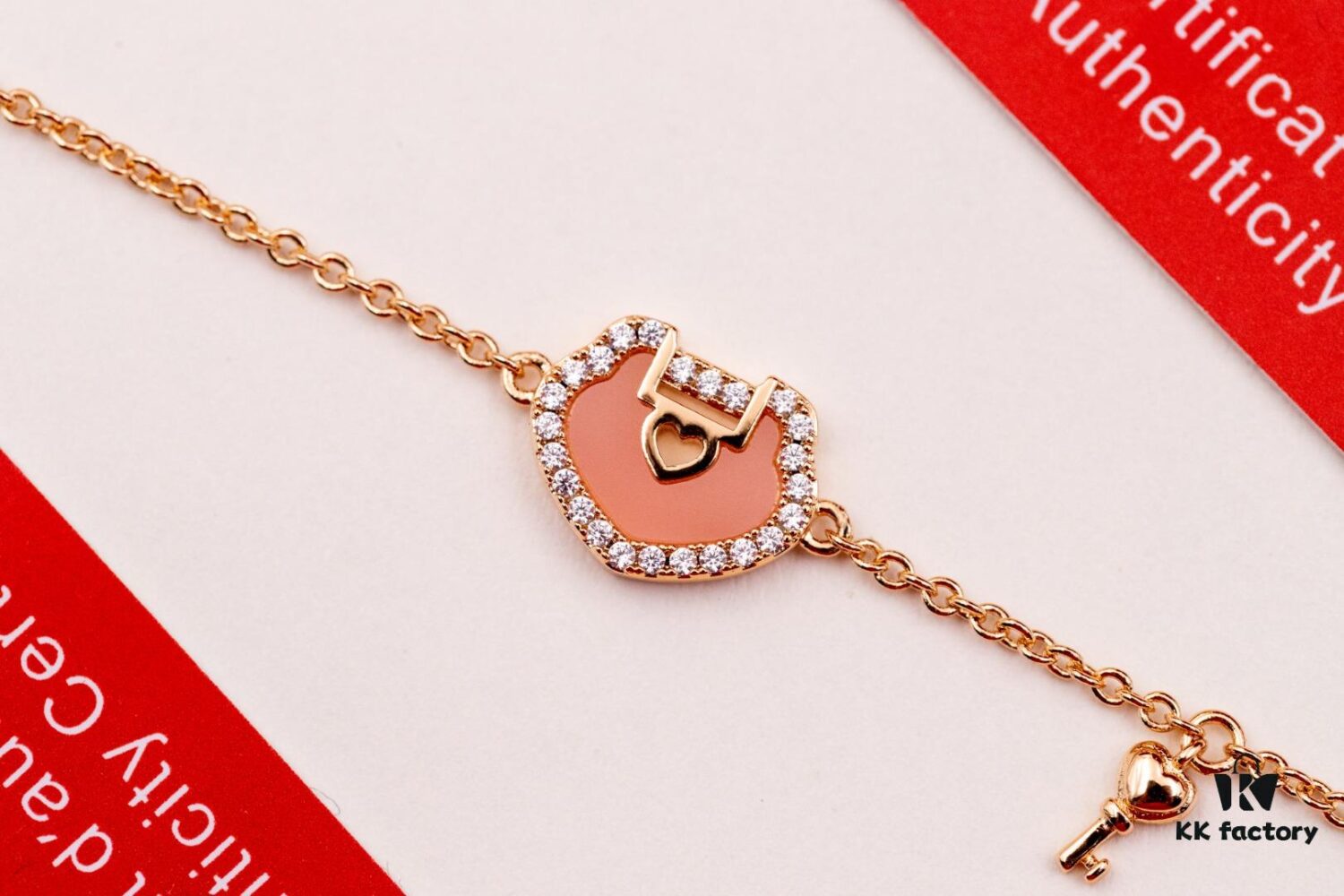 692fd8c599f2d84055c8ad3f Kirin Qixi Little Pink Lock Bracelet