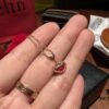 692fd9a899f2d84055c8aebc High-Grade Red Agate Pendant with Diamond Accents, Symbolizing Peace, Good Fortune, and Happiness