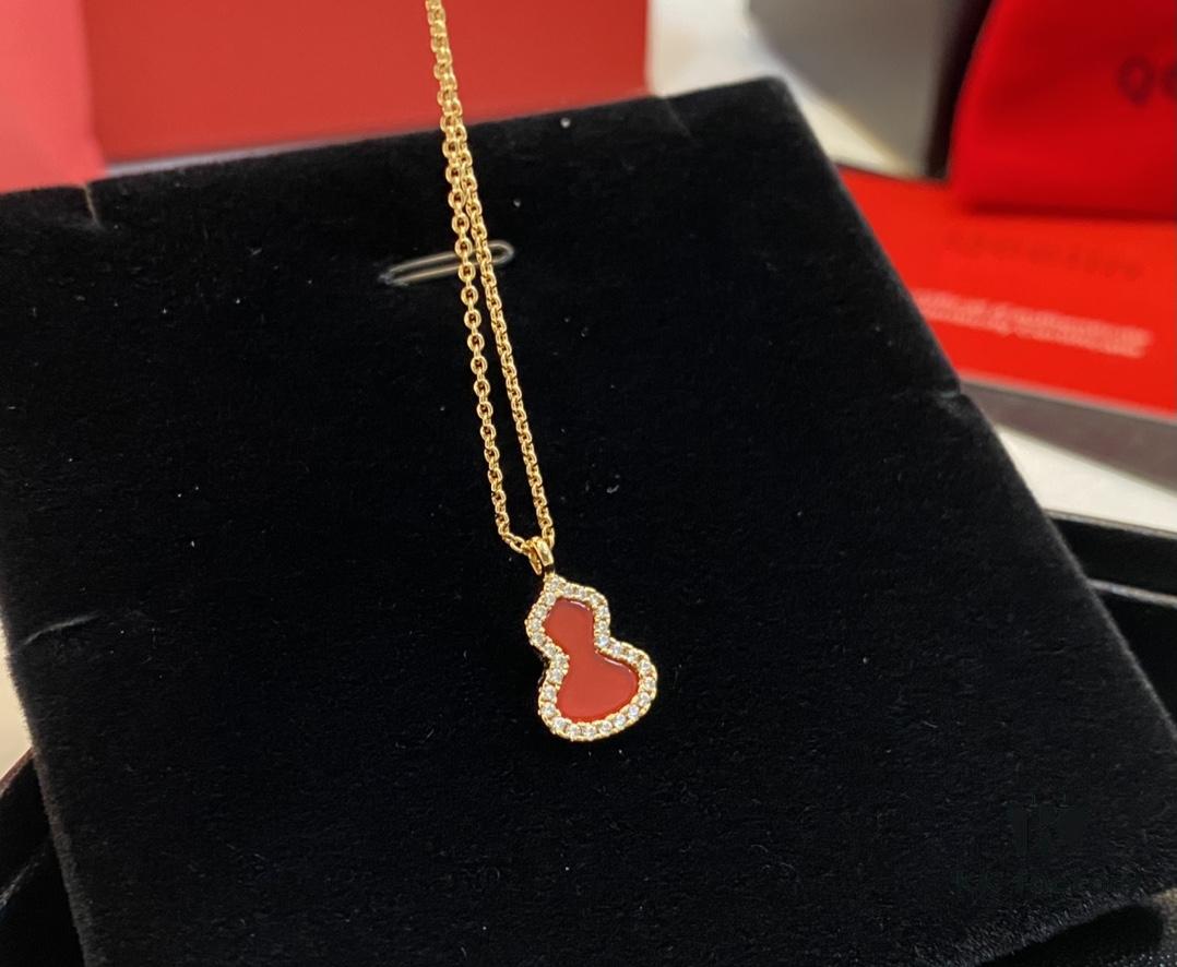 692fd9b799f2d84055c8aed6 Red Gourd Real Shot: Red Agate Necklace with Vivid Color and Crystal Clarity