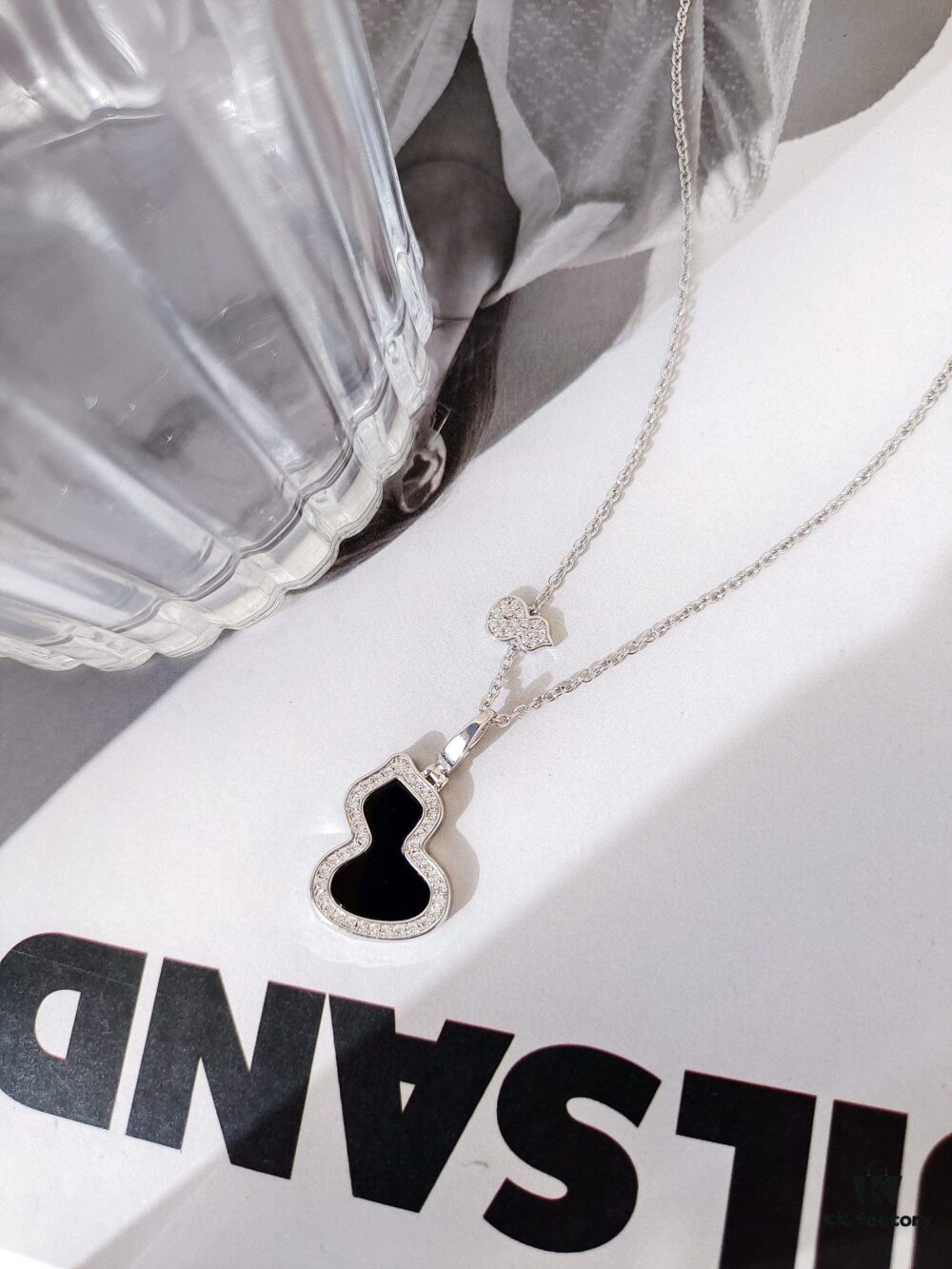 692fda8e99f2d84055c8afe1 Exquisitely Crafted Gourd Pendant Necklace with Hand-Set Stones and Custom Clasp