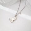 692fda9499f2d84055c8afe7 Exquisitely Crafted Gourd Pendant Necklace with Hand-Set Stones and Custom Clasp