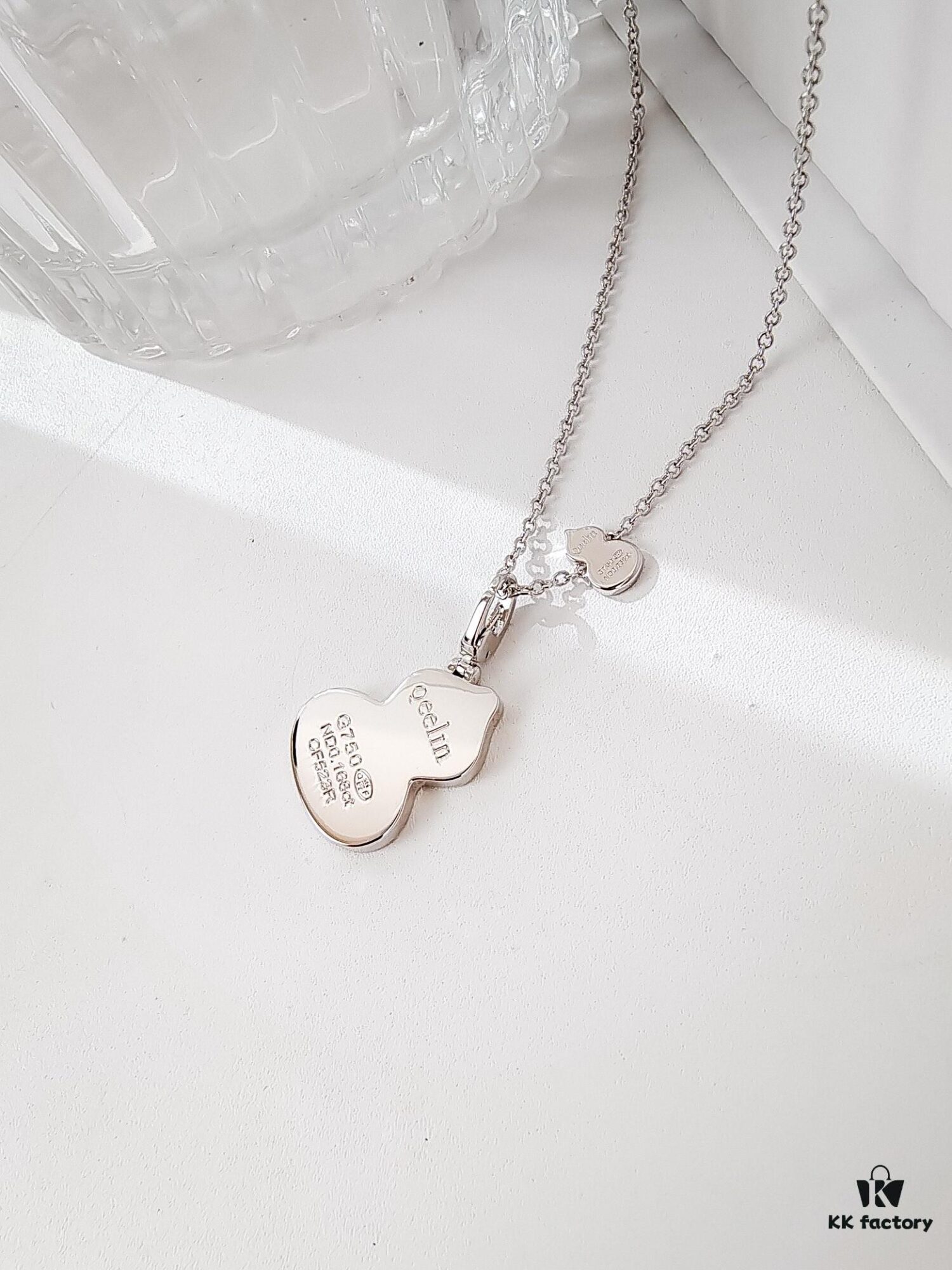 692fda9499f2d84055c8afe7 Exquisitely Crafted Gourd Pendant Necklace with Hand-Set Stones and Custom Clasp