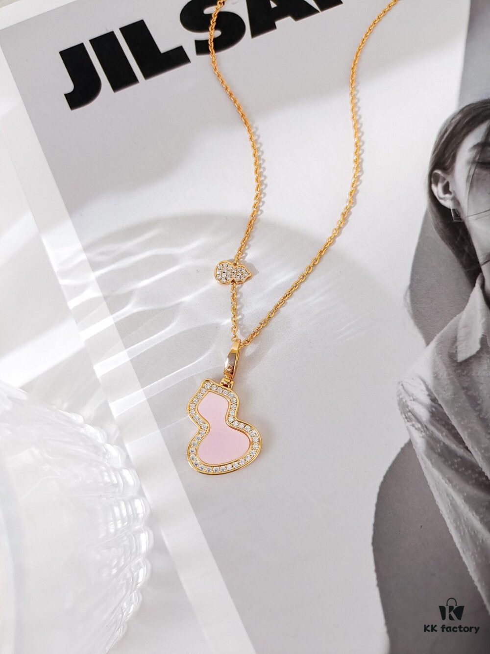 692fda9499f2d84055c8afe8 Exquisitely Crafted Gourd Pendant Necklace with Hand-Set Stones, V-Gold Material, Unique Design
