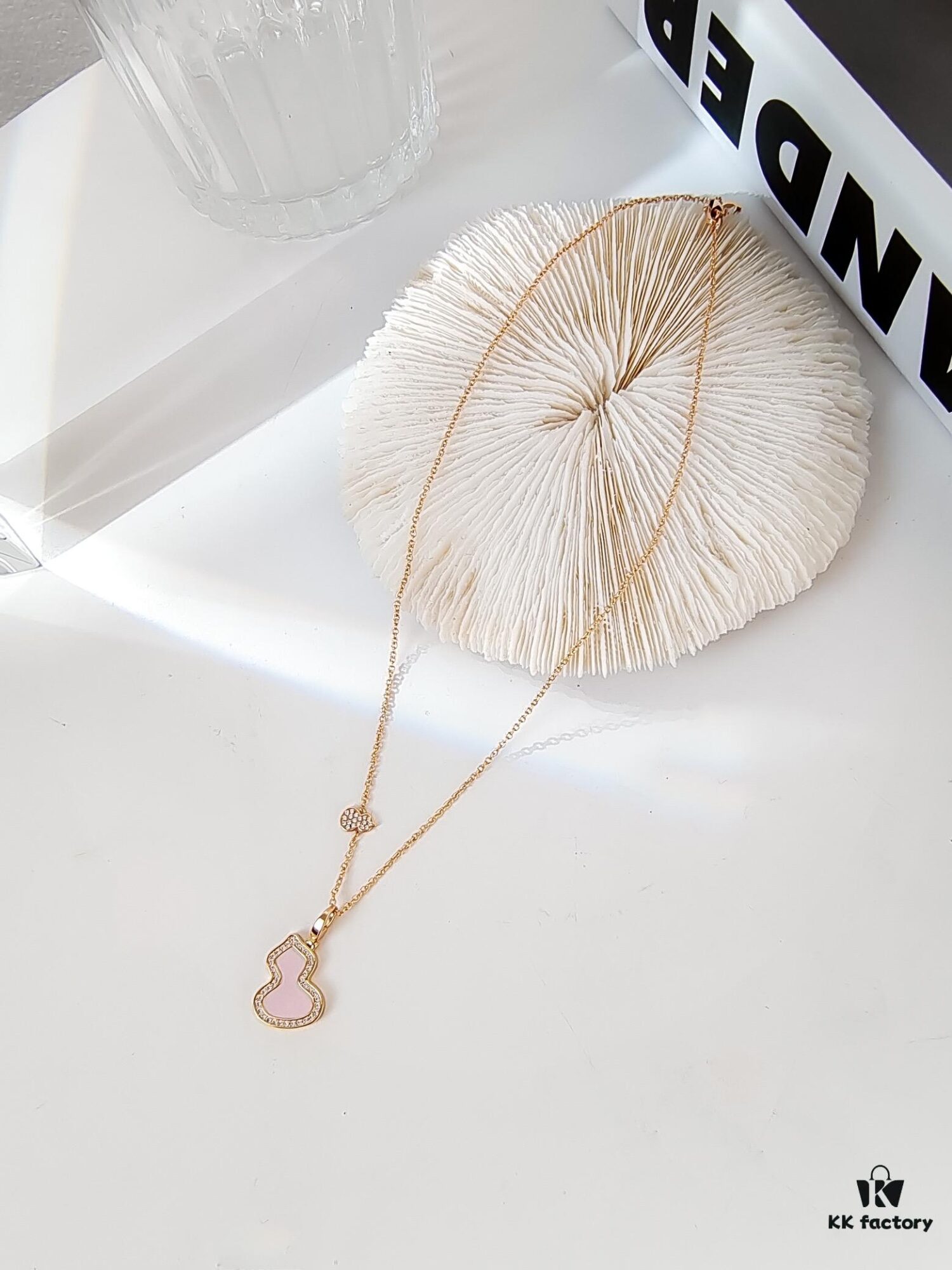 692fda9a99f2d84055c8aff0 Exquisitely Crafted Gourd Pendant Necklace with Hand-Set Stones, V-Gold Material, Unique Design