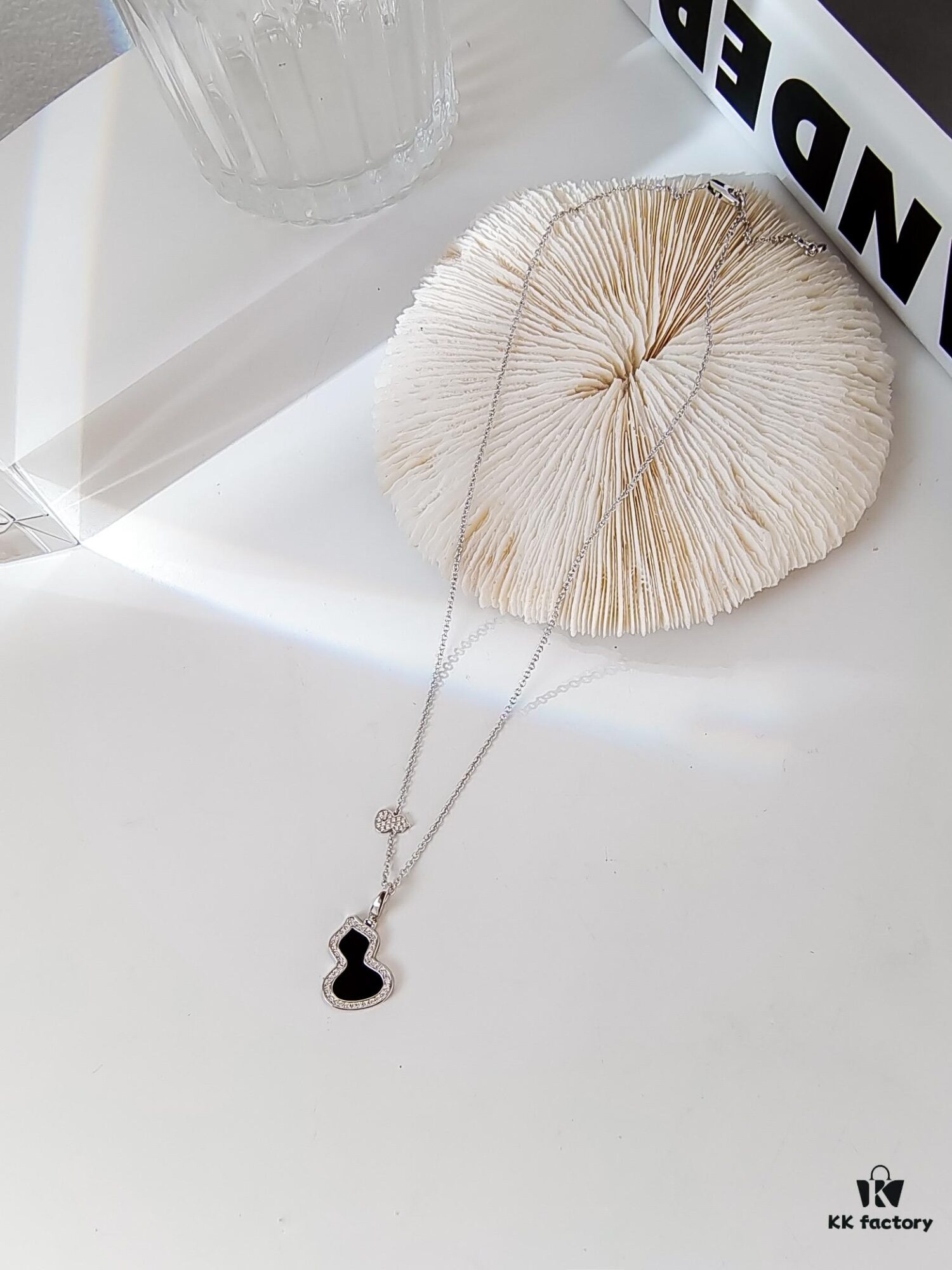692fdabd99f2d84055c8b021 Exquisitely Crafted Gourd Pendant Necklace with Hand-Set Stones and Custom Clasp