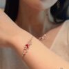 692fdada99f2d84055c8b051 Qeelin Lucky Red Gourd Bracelet with Three Gourds
