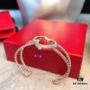 692fdb0799f2d84055c8b095 Qeelin Wulu Hollow-out Red Diamond Twisted Edge Open Bangle, White Agate Inlay, Chinese Cultural Elements with Modern Design, Luxury Jewelry