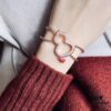 692fdb0999f2d84055c8b097 Qeelin Wulu Hollow-out Red Diamond Twisted Edge Open Bangle, White Agate Inlay, Chinese Cultural Elements with Modern Design, Luxury Jewelry