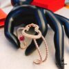 692fdb0d99f2d84055c8b09c Qeelin Wulu Hollow-out Red Diamond Twisted Edge Open Bangle, White Agate Inlay, Chinese Cultural Elements with Modern Design, Luxury Jewelry