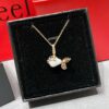 692fdb3f99f2d84055c8b0ed Kirin Goldfish Necklace, New Arrival from Boutique, Featuring Agate Body with Encapsulated Design and Expert Diamond Paving for a Vivid, Lifelike Appearance