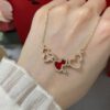 692fdbac99f2d84055c8b19f Kylin Red Agate Three Gourds Necklace