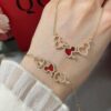 692fdbb999f2d84055c8b1b1 Kylin Red Agate Three Gourds Bracelet