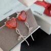 692fdd1a99f2d84055c8b3ec HEFANG Jewelry Red Heart Ribbon Earrings, High-Grade Silver with Logo