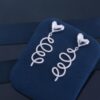 692fddda99f2d84055c8b56d HEFANG Jewelry Cream Twirl Earrings - Limited Edition Ear Studs, Celebrity Style (Zhou Yutong's Pick), Ideal Gift for Qixi Festival