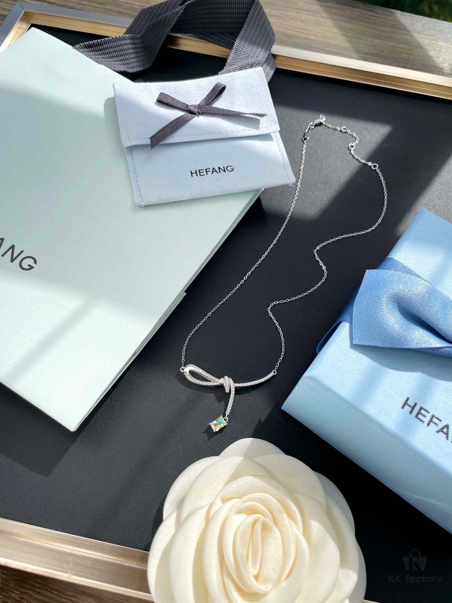 692fdf8e99f2d84055c8b76f He Fang Aurora Ribbon Knot Collarbone Necklace, Exquisitely Crafted from S925 Silver with Shimmering Diamond Accents and Colorful Iridescent Cube Pendant