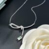 692fdf8f99f2d84055c8b771 He Fang Aurora Ribbon Knot Collarbone Necklace, Exquisitely Crafted from S925 Silver with Shimmering Diamond Accents and Colorful Iridescent Cube Pendant