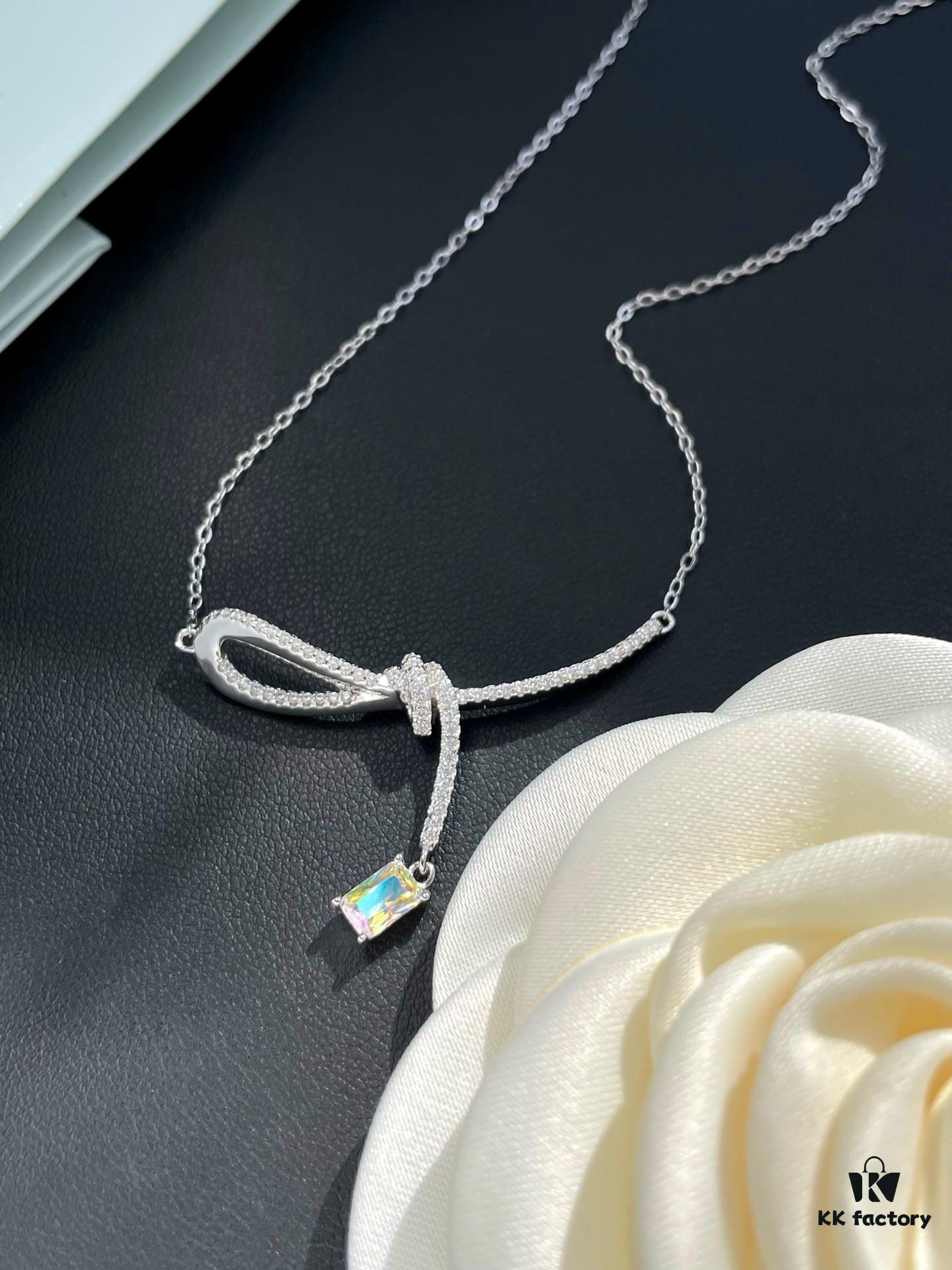 692fdf8f99f2d84055c8b771 He Fang Aurora Ribbon Knot Collarbone Necklace, Exquisitely Crafted from S925 Silver with Shimmering Diamond Accents and Colorful Iridescent Cube Pendant