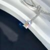 692fdf9399f2d84055c8b774 He Fang Aurora Ribbon Knot Collarbone Necklace, Exquisitely Crafted from S925 Silver with Shimmering Diamond Accents and Colorful Iridescent Cube Pendant