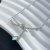 692fdf9499f2d84055c8b776 He Fang Aurora Ribbon Knot Collarbone Necklace, Exquisitely Crafted from S925 Silver with Shimmering Diamond Accents and Colorful Iridescent Cube Pendant