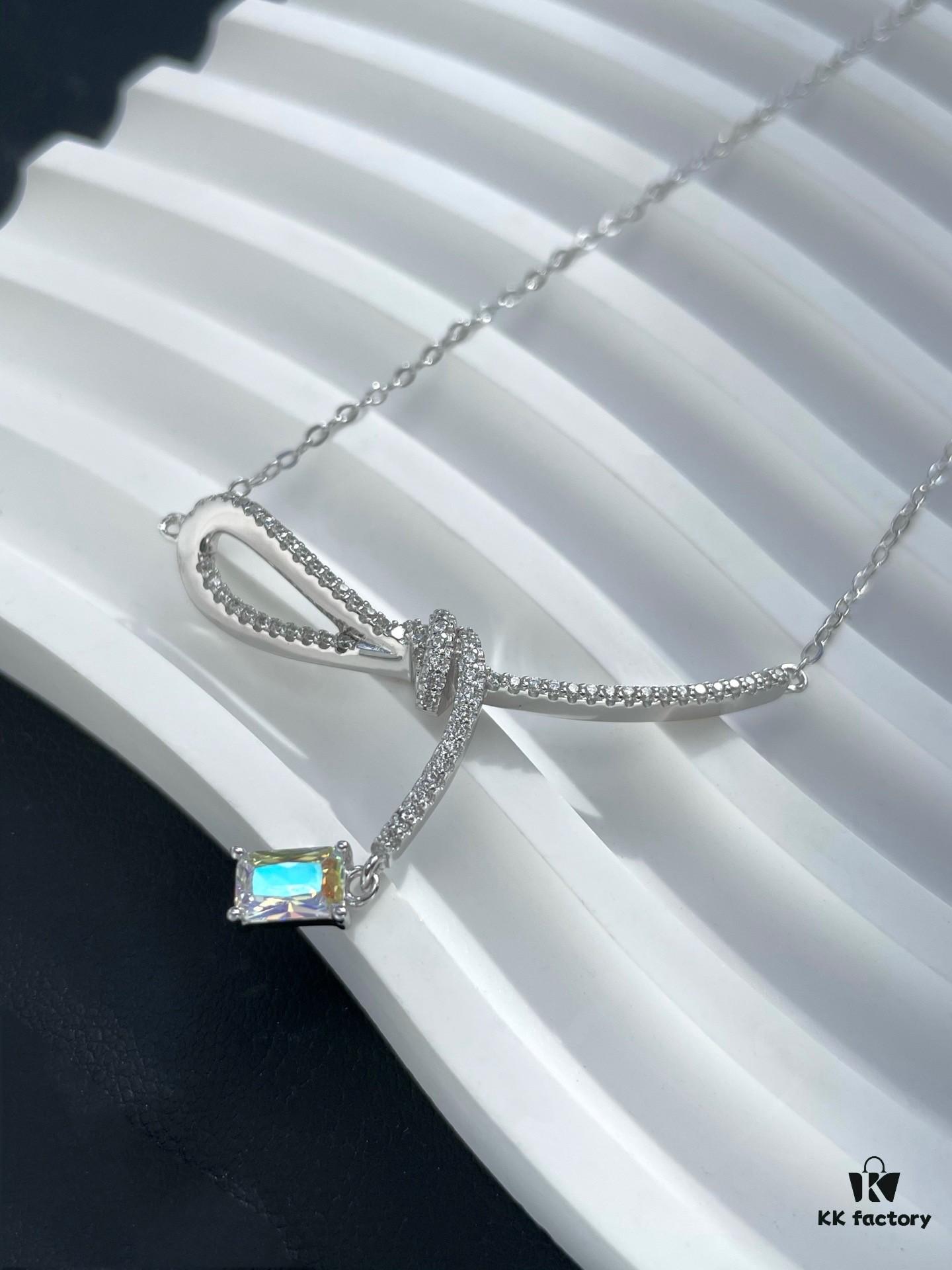 692fdf9499f2d84055c8b776 He Fang Aurora Ribbon Knot Collarbone Necklace, Exquisitely Crafted from S925 Silver with Shimmering Diamond Accents and Colorful Iridescent Cube Pendant