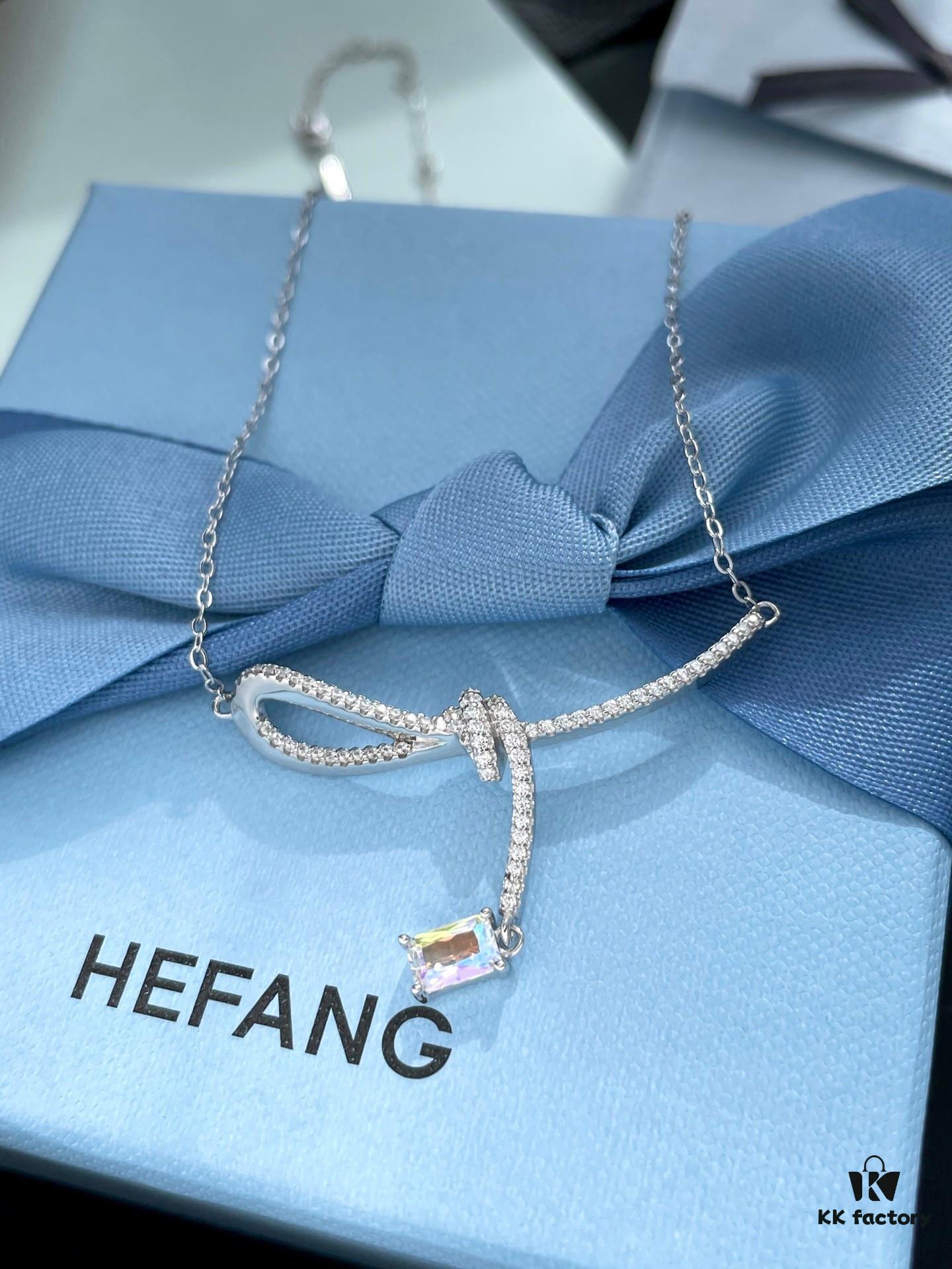 692fdf9899f2d84055c8b77a He Fang Aurora Ribbon Knot Collarbone Necklace, Exquisitely Crafted from S925 Silver with Shimmering Diamond Accents and Colorful Iridescent Cube Pendant