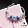 692fe15099f2d84055c8ba28 Pandora Blue Daisy Flower with Pink Enamel - New Arrival