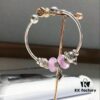 692fe1a299f2d84055c8badd Pandora Afternoon Tea Collection - Elegant Purple Glow Bead with Heart Bow, Teapot Fairy, and Pink Cup Design