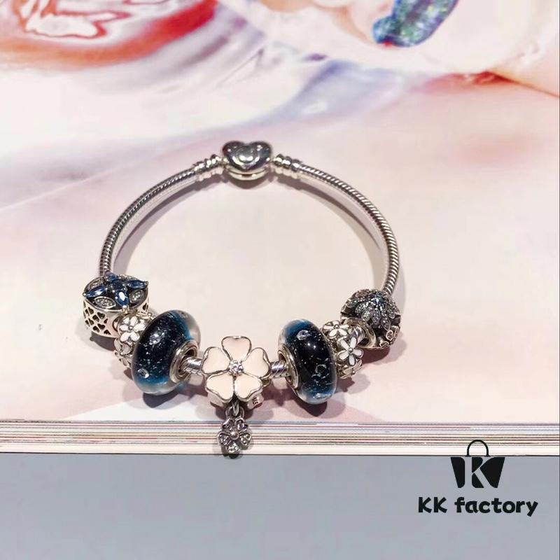 692fe20099f2d84055c8bbc0 Pandora Night Sky Blue Elegant Pink Flower Design! Crafted with authentic boutique materials, perfectly replicating the original store quality. Features night sky blue bubbled glass, delicate cherry blossom spacers, cross snowflake charm, elegant pink flower accent, and is made of S925 silver, complete with official boutique packaging!