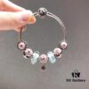692fe21099f2d84055c8bbe0 Special Offer! Pandora Golden Thread Light Mint Pink Peach Blossom Design Bracelet