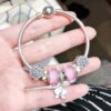 692fe24399f2d84055c8bc47 Pandora Silver Pink Elegant Orchid New Arrival! Silver pink faceted glass beads, heart spacer bead, elegant orchid pendant, sparkling diamond-like snowflake charm, S925 silver with official boutique packaging!
