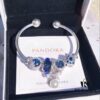 692fe2a299f2d84055c8bd11 Pandora Blue Pearl Bow Knot Bracelet - New Arrival with Sparkling Blue Faceted Glass and Snowflake Cat's Eye