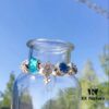 692fe34099f2d84055c8be2f Pandora Lake Blue Bubble Daisy Flower Blossom 🌼 New Arrival! Made with authentic boutique materials, perfectly crafted to match retail quality! Featuring vibrant lake blue bubble glass, sparkling ocean blue cat's eye stone, lucky coin charm, fully diamond-set daisy flower and daisy safety chain, paired with a diamond-encrusted daisy pendant. Crafted in S925 sterling silver, complete with official boutique packaging!