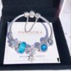 692fe34099f2d84055c8be30 Pandora Lake Blue Bubble Daisy Flower Blossom 🌼 New Arrival! Made with authentic boutique materials, perfectly crafted to match retail quality! Featuring vibrant lake blue bubble glass, sparkling ocean blue cat's eye stone, lucky coin charm, fully diamond-set daisy flower and daisy safety chain, paired with a diamond-encrusted daisy pendant. Crafted in S925 sterling silver, complete with official boutique packaging!