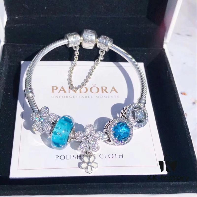 692fe34099f2d84055c8be30 Pandora Lake Blue Bubble Daisy Flower Blossom 🌼 New Arrival! Made with authentic boutique materials, perfectly crafted to match retail quality! Featuring vibrant lake blue bubble glass, sparkling ocean blue cat's eye stone, lucky coin charm, fully diamond-set daisy flower and daisy safety chain, paired with a diamond-encrusted daisy pendant. Crafted in S925 sterling silver, complete with official boutique packaging!