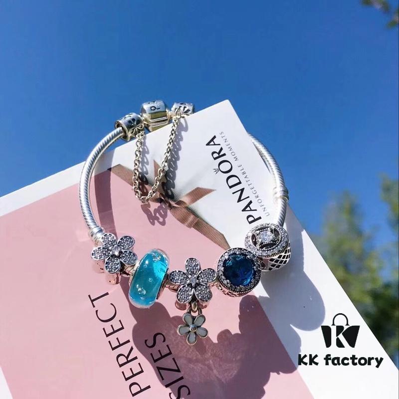 692fe34099f2d84055c8be31 Pandora Lake Blue Bubble Daisy Flower Blossom 🌼 New Arrival! Made with authentic boutique materials, perfectly crafted to match retail quality! Featuring vibrant lake blue bubble glass, sparkling ocean blue cat's eye stone, lucky coin charm, fully diamond-set daisy flower and daisy safety chain, paired with a diamond-encrusted daisy pendant. Crafted in S925 sterling silver, complete with official boutique packaging!