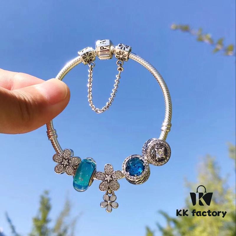 692fe34299f2d84055c8be35 Pandora Lake Blue Bubble Daisy Flower Blossom 🌼 New Arrival! Made with authentic boutique materials, perfectly crafted to match retail quality! Featuring vibrant lake blue bubble glass, sparkling ocean blue cat's eye stone, lucky coin charm, fully diamond-set daisy flower and daisy safety chain, paired with a diamond-encrusted daisy pendant. Crafted in S925 sterling silver, complete with official boutique packaging!