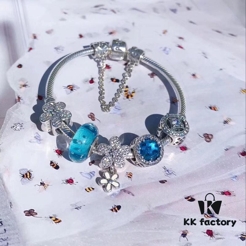 692fe34399f2d84055c8be36 Pandora Lake Blue Bubble Daisy Flower Blossom 🌼 New Arrival! Made with authentic boutique materials, perfectly crafted to match retail quality! Featuring vibrant lake blue bubble glass, sparkling ocean blue cat's eye stone, lucky coin charm, fully diamond-set daisy flower and daisy safety chain, paired with a diamond-encrusted daisy pendant. Crafted in S925 sterling silver, complete with official boutique packaging!