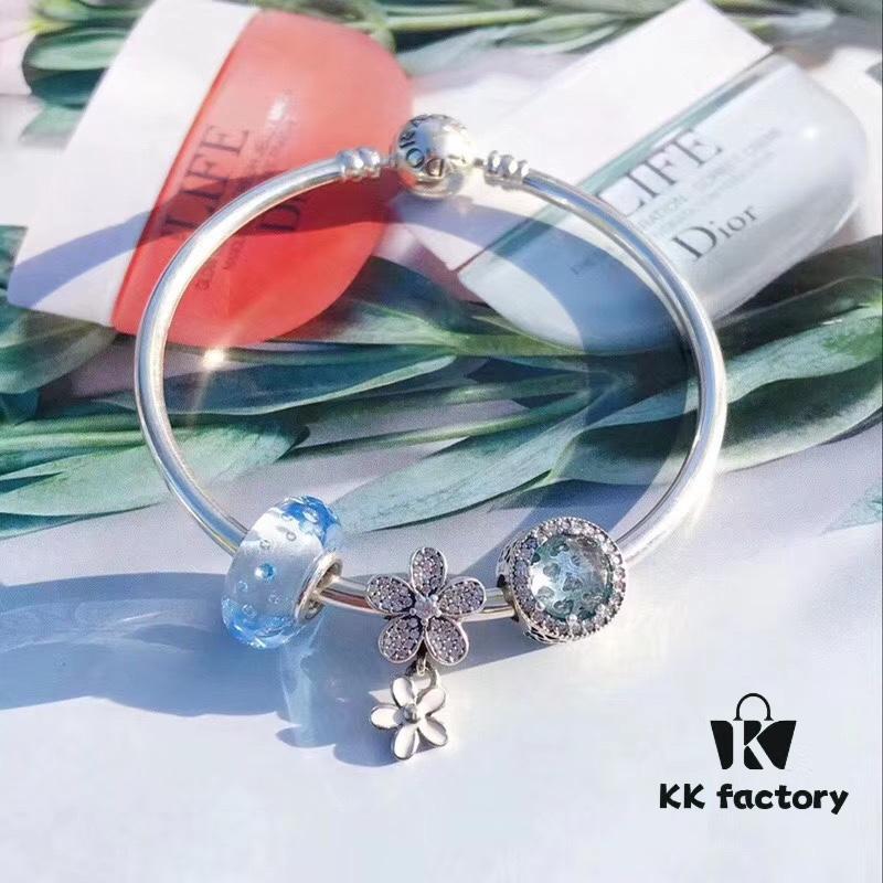 692fe36a99f2d84055c8be77 Pandora Ice Blue Bubble Sparkling Diamond Daisy New Arrival! Made with counter materials, perfectly crafted 1:1, quality comparable to official store products! Featuring bubble ice blue glass, ice blue cat's eye, sparkling diamond daisy, S925 silver with original packaging!