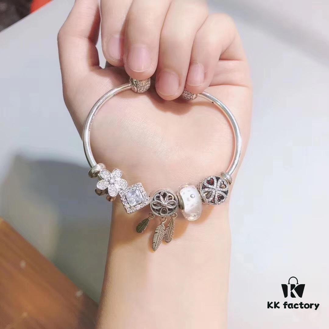 692fe3f299f2d84055c8bf76 Pandora White Bubble Dreamcatcher Pendant with Sparkling Rhinestones, Daisy Flower, Hollow Four-Leaf Clover, and Cat's Eye Cubic Zirconia